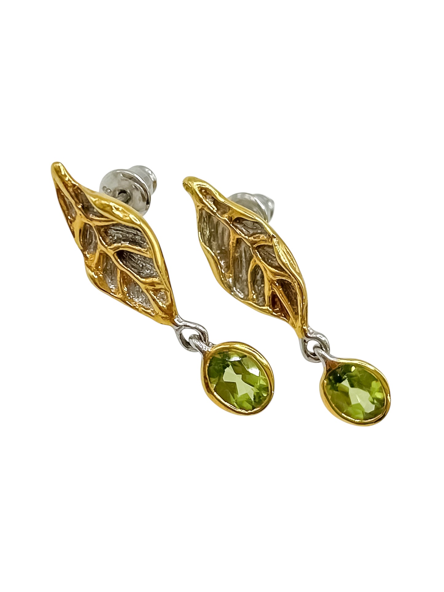 Silver Designed Earrings With Peridots