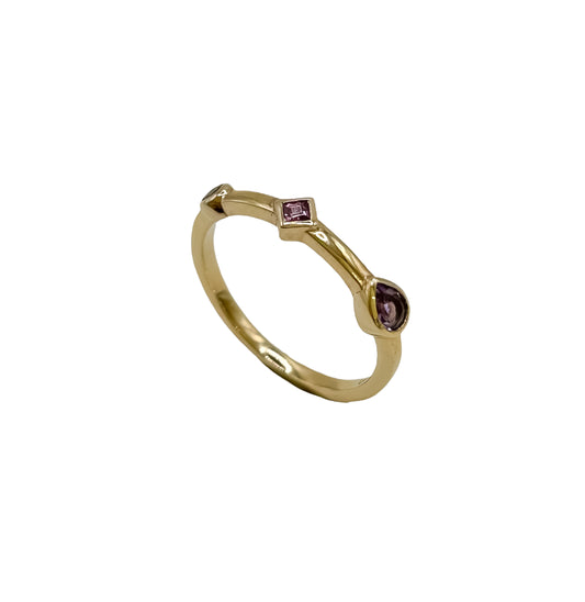 Rose gold ring with gemstones